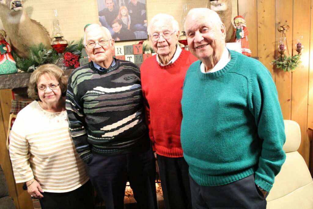 Photo of Rita Spriggs, Troy Pence, Don Pence, and Paul Pence.