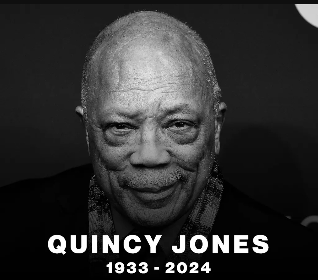 A black and white portrait shows the name Quincy Jones