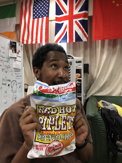 I wear a very happy suprised look on my face after being given a bag of Red Hot Ripplets spicy potato chips that you can only get in St Louis, but in Tokyo a few years ago.