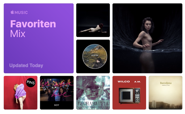 Screenshot of Favourites Mix in Apple Music showing album covers, including The Planet by Young Ejecta which depicts a woman naked from the waist up