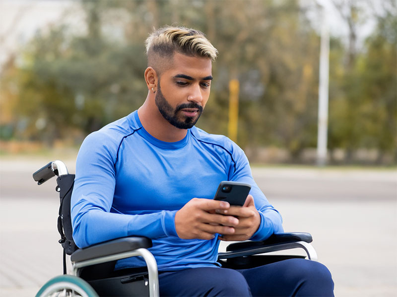 AI genrated a picture of me in my wheelchair looking at my Nokia mobile phone