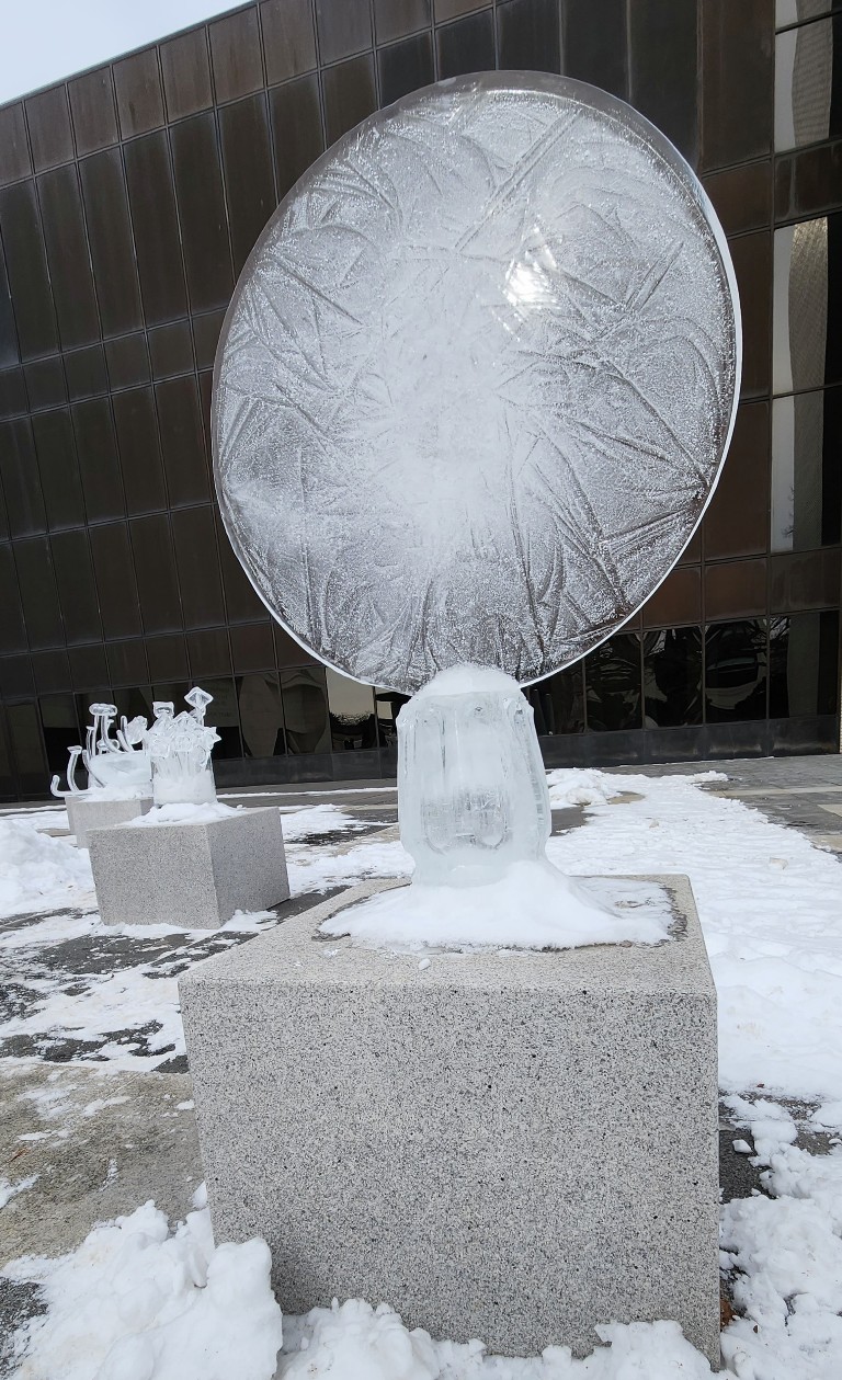 Ice Sculpture of Disc on pedestal