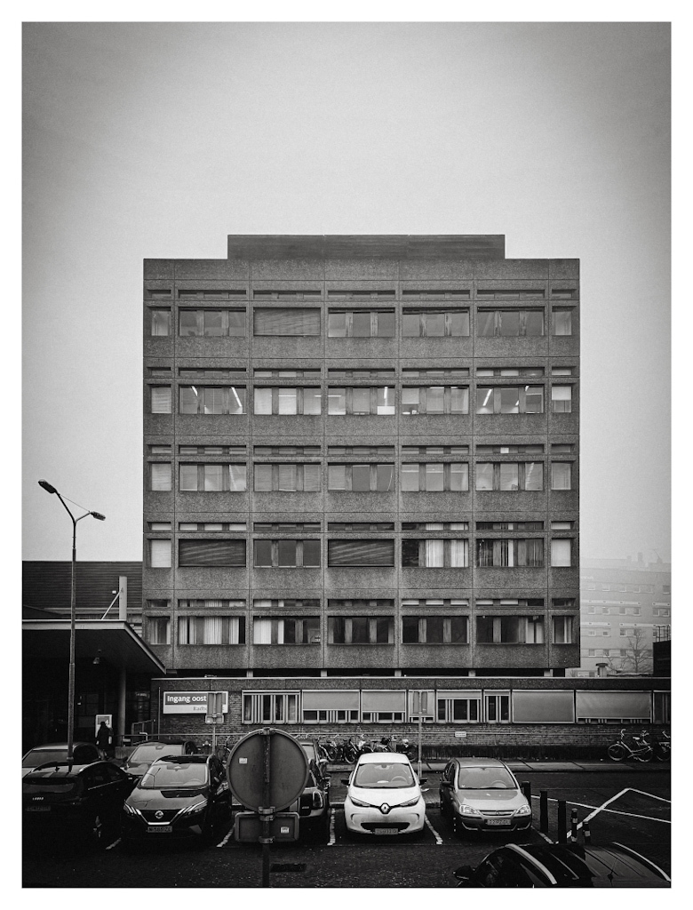 Old hospital building, in black and white. 