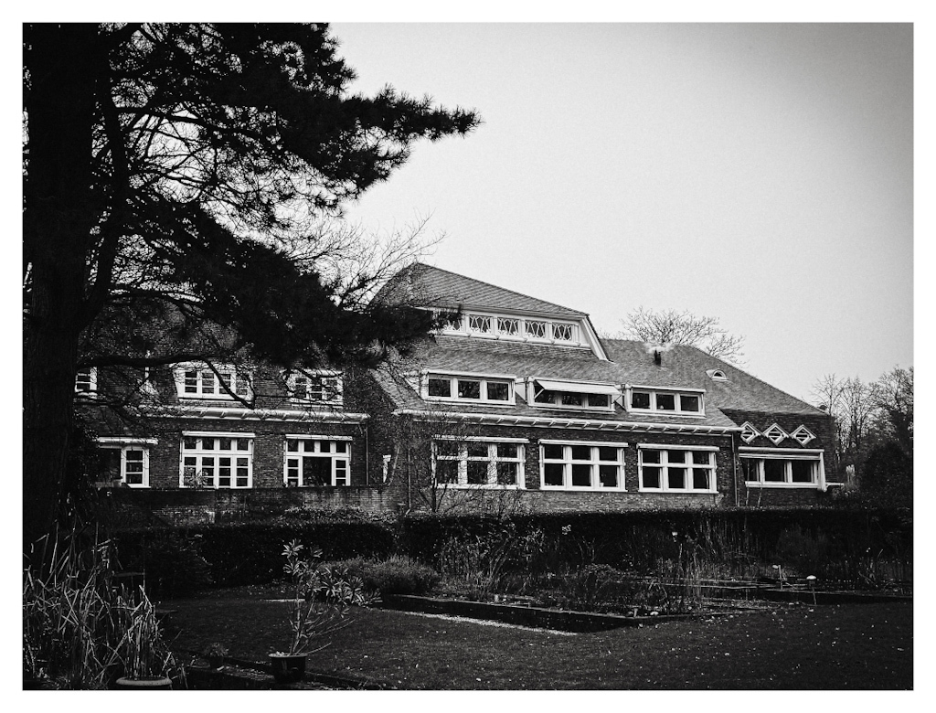 Building of the former Laboratory of Plant Physiology of the Wageningen University of Applied Sciences. Designed by architect C.J. Blaauw in the Amsterdam School style of architecture. In black and white. 