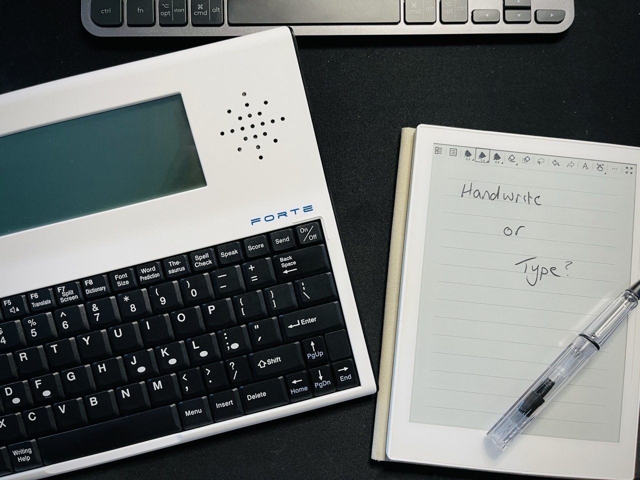 The Writer Forte word processor next to the SuperNote A6X eink writing tablet | Photo by author