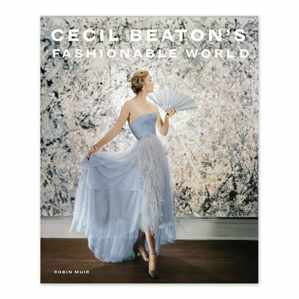A woman in a stylish, flowing gown, holding a fan, is featured on the cover of a book titled Cecil Beaton's Fashionable World by Robin Muir.