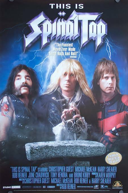 A movie poster features three rock band members with dramatic hairstyles and leather jackets, set against a stonehenge backdrop, promoting This Is Spinal Tap.