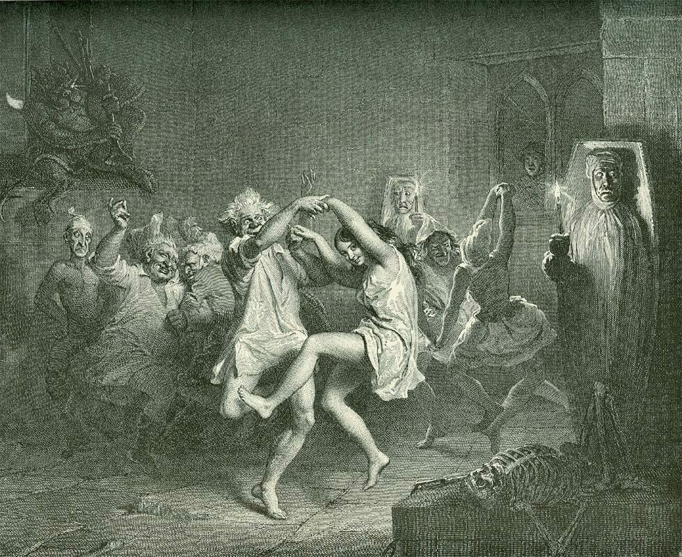A group of people in a dark, eerie room are dancing energetically in the foreground while others look on, surrounded by skeletons and mysterious figures.