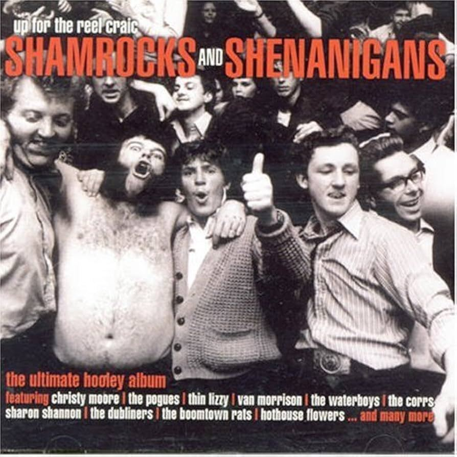 A group of men, some shirtless and celebrating, is pictured on the cover of an album titled Shamrocks and Shenanigans.