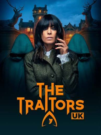 A woman stands in front of a castle surrounded by mysterious hooded figures, with the text The Traitors UK below.