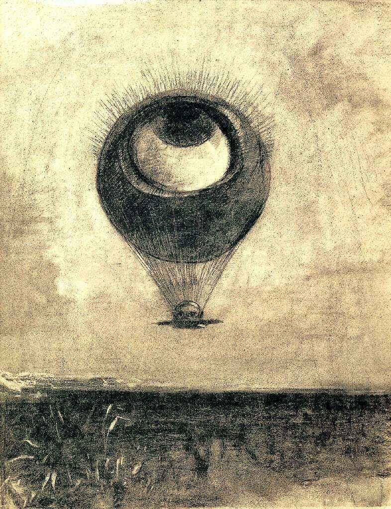 This image depicts an artwork featuring an eye-shaped hot air balloon floating above a flat horizon. The balloon's envelope is the iris and pupil, complete with detailed lines to represent the eye's texture, and the basket hangs directly below, appearing as the eye's reflection. The sky is hazy and indistinct, giving the impression of a sketch or etching with soft, undefined clouds. Below is a dark landscape, likely a field, with the suggestion of grass or crops. The piece has an eerie quality, combining elements of the everyday with the surreal, drawing a direct visual parallel between the act of observation and the concept of flight.