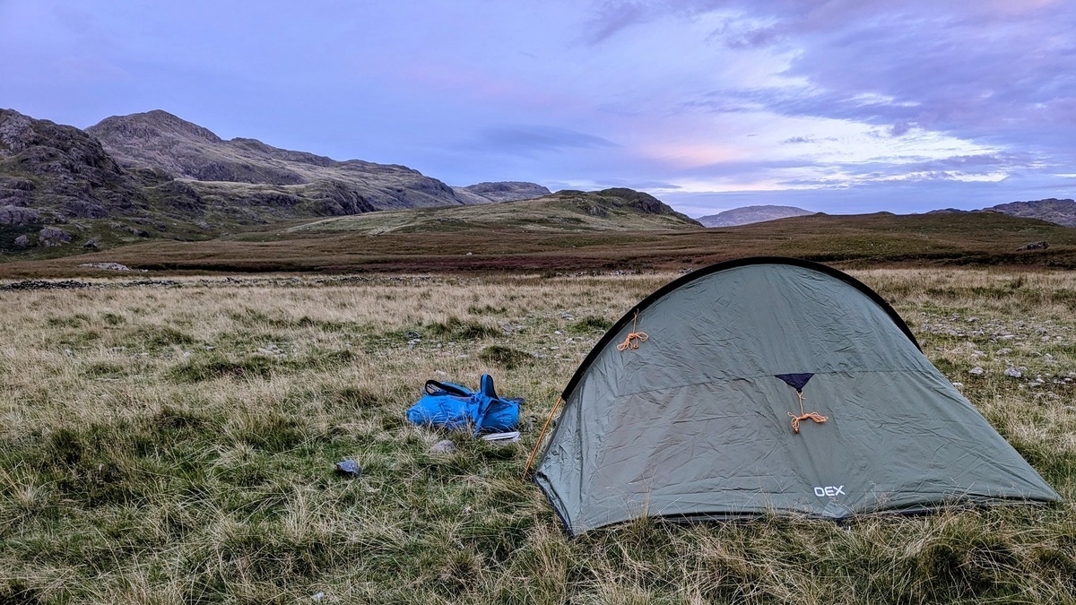 Tent with mountains in background