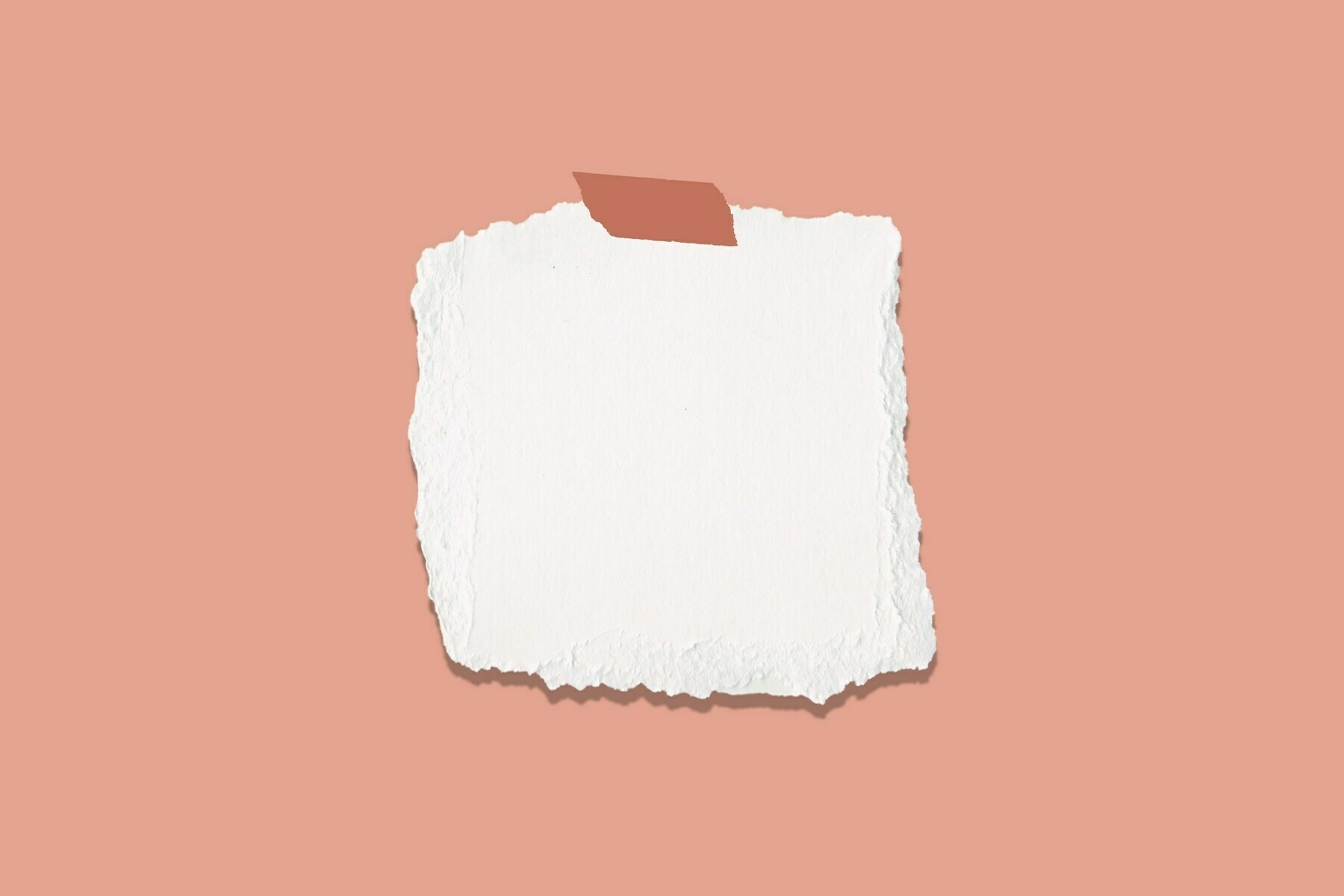 A piece of textured white paper with rough edges taped onto a soft peach background.
