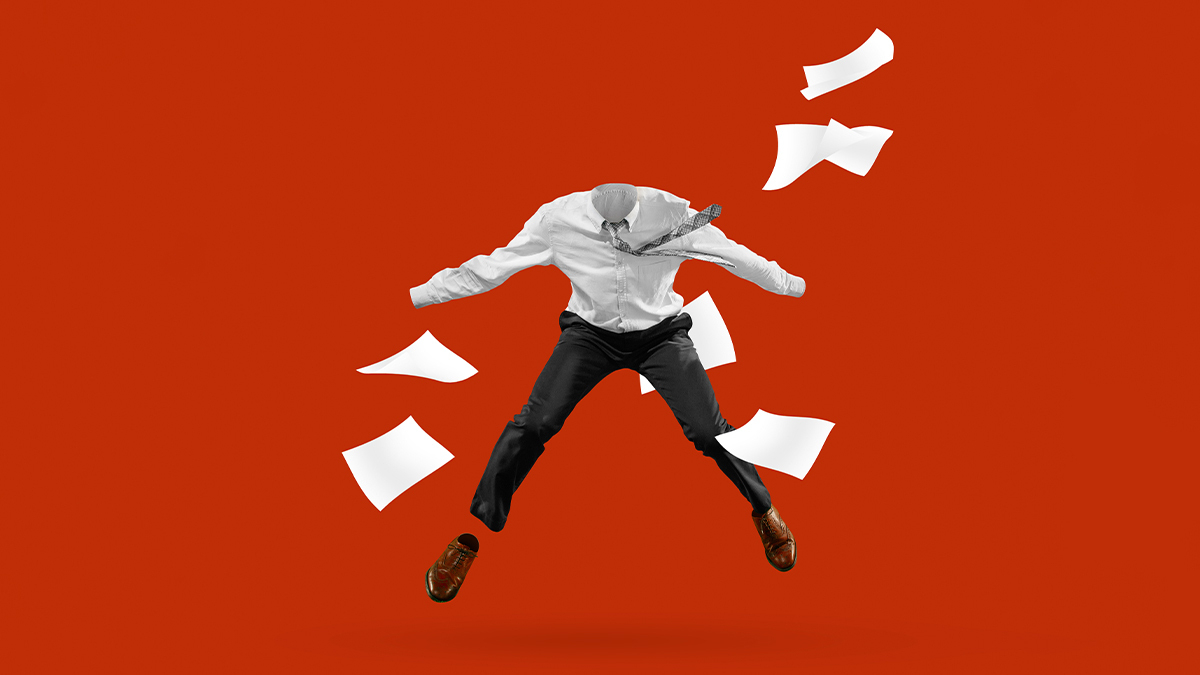 Headless man in a white shirt, dark trousers, and brown shoes, suspended in mid-air with scattered white sheets of paper, against a red background.