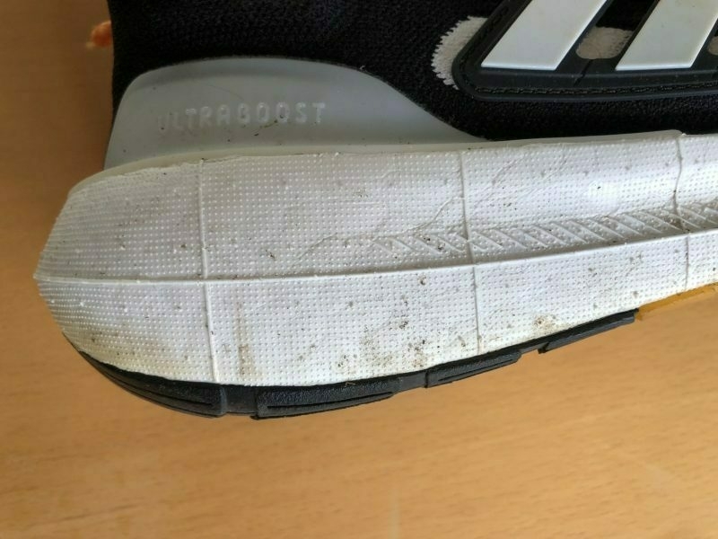 Photograph of back half of a running shoe showing midsole