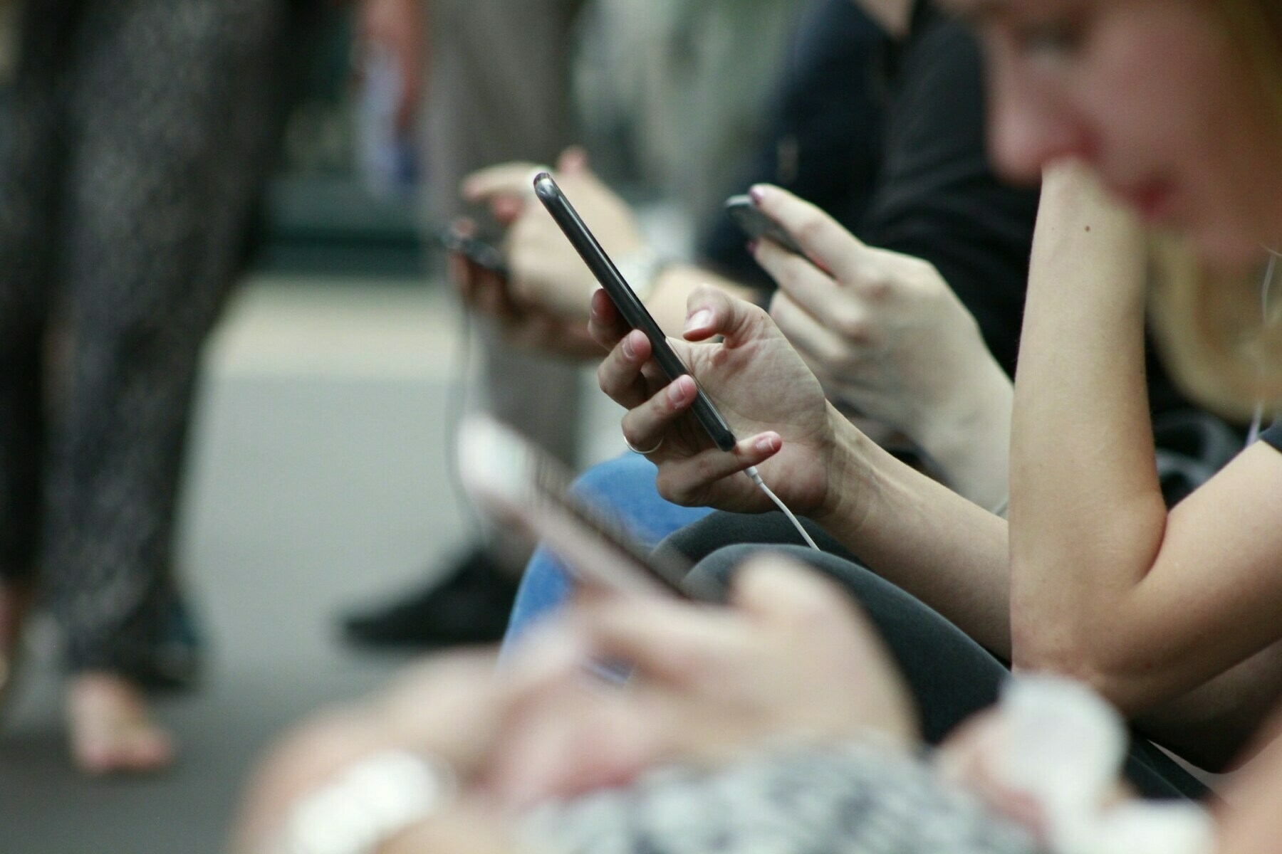 Person holding black phone