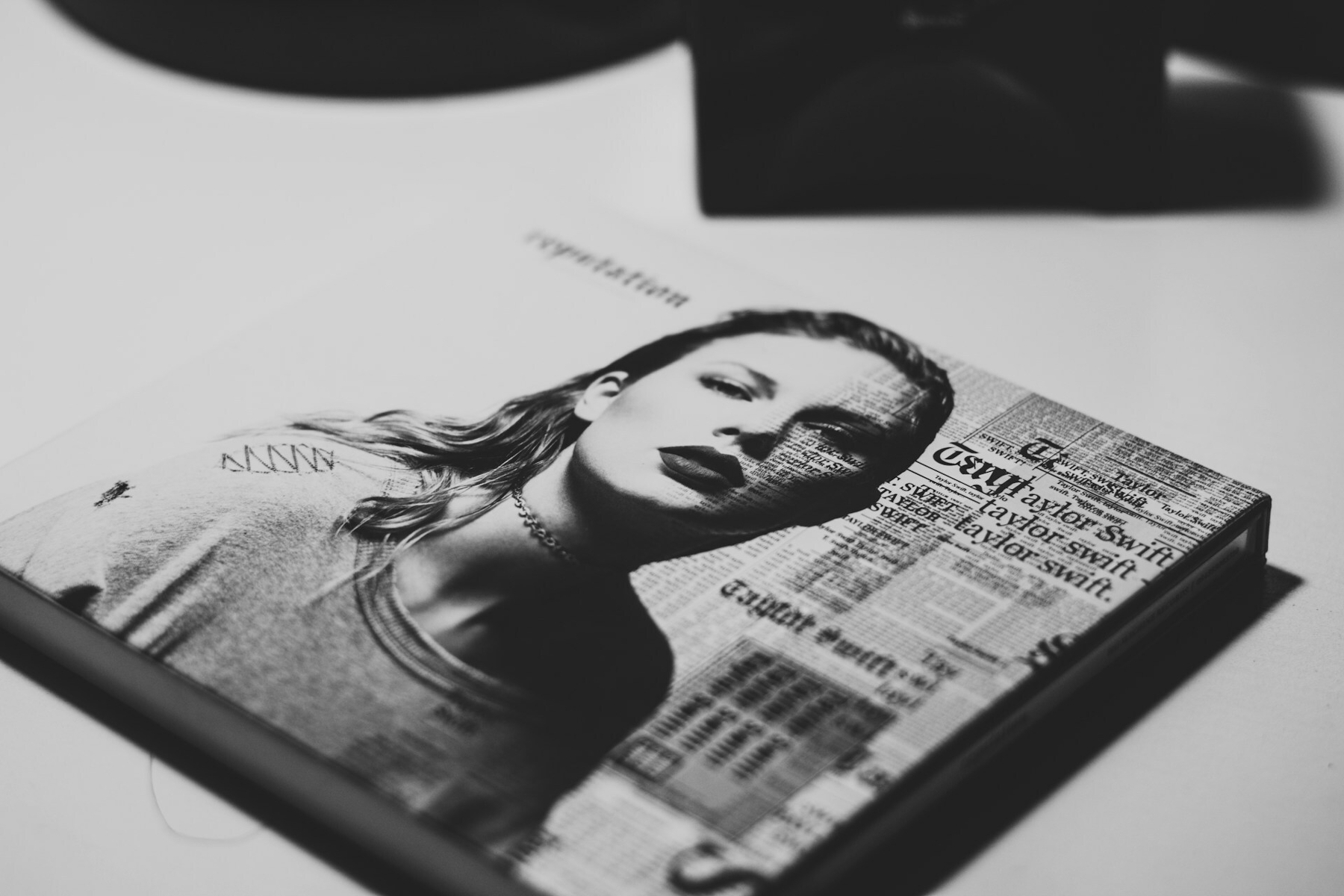 Black and white photo of Taylor Swift album cover
