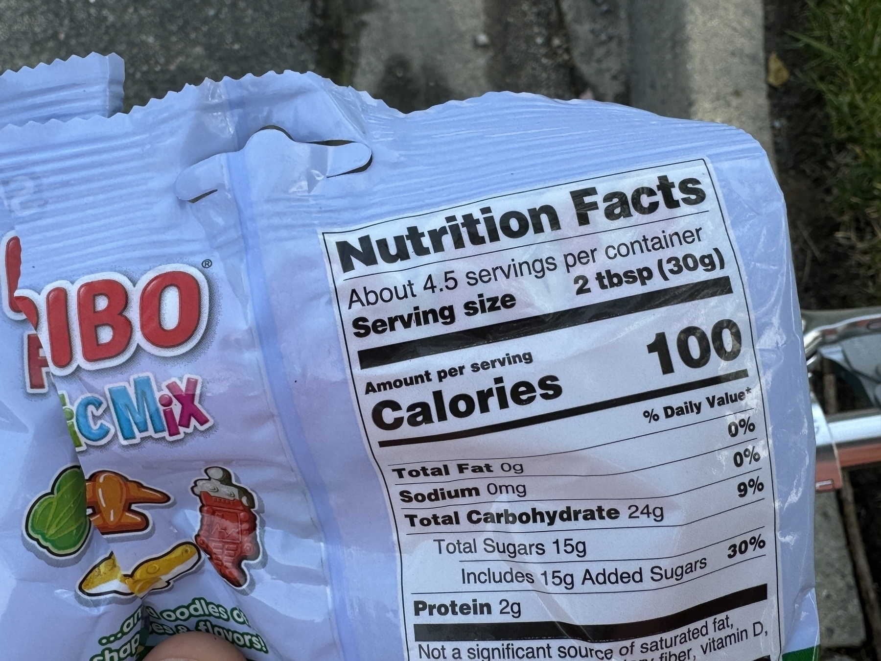 The back of a Haribo Funtastic Mix candy package showing the nutrition label and suggested serving size, measured as 2 tbsp (30g)