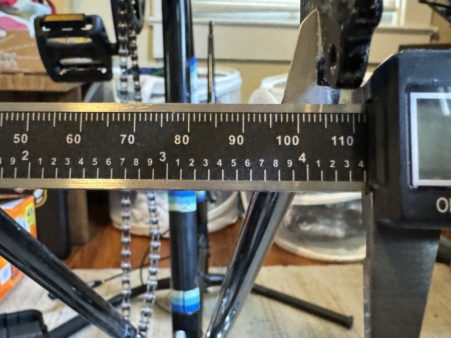 A set of calipers showing just over 110mm width between the rear dropouts of my Fairdale Coaster bike