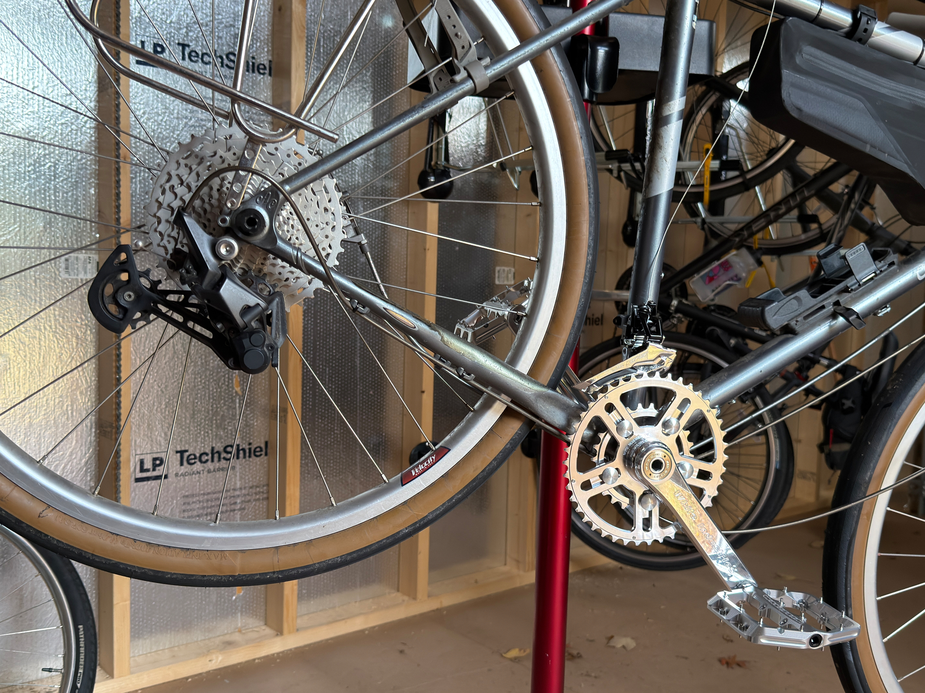 Cropped photo of my bike in a bike stand in my shed
