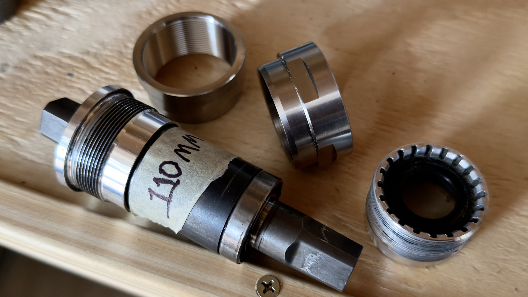 110mm bottom bracket with non-drive-side cup and two press-fit conversion cups