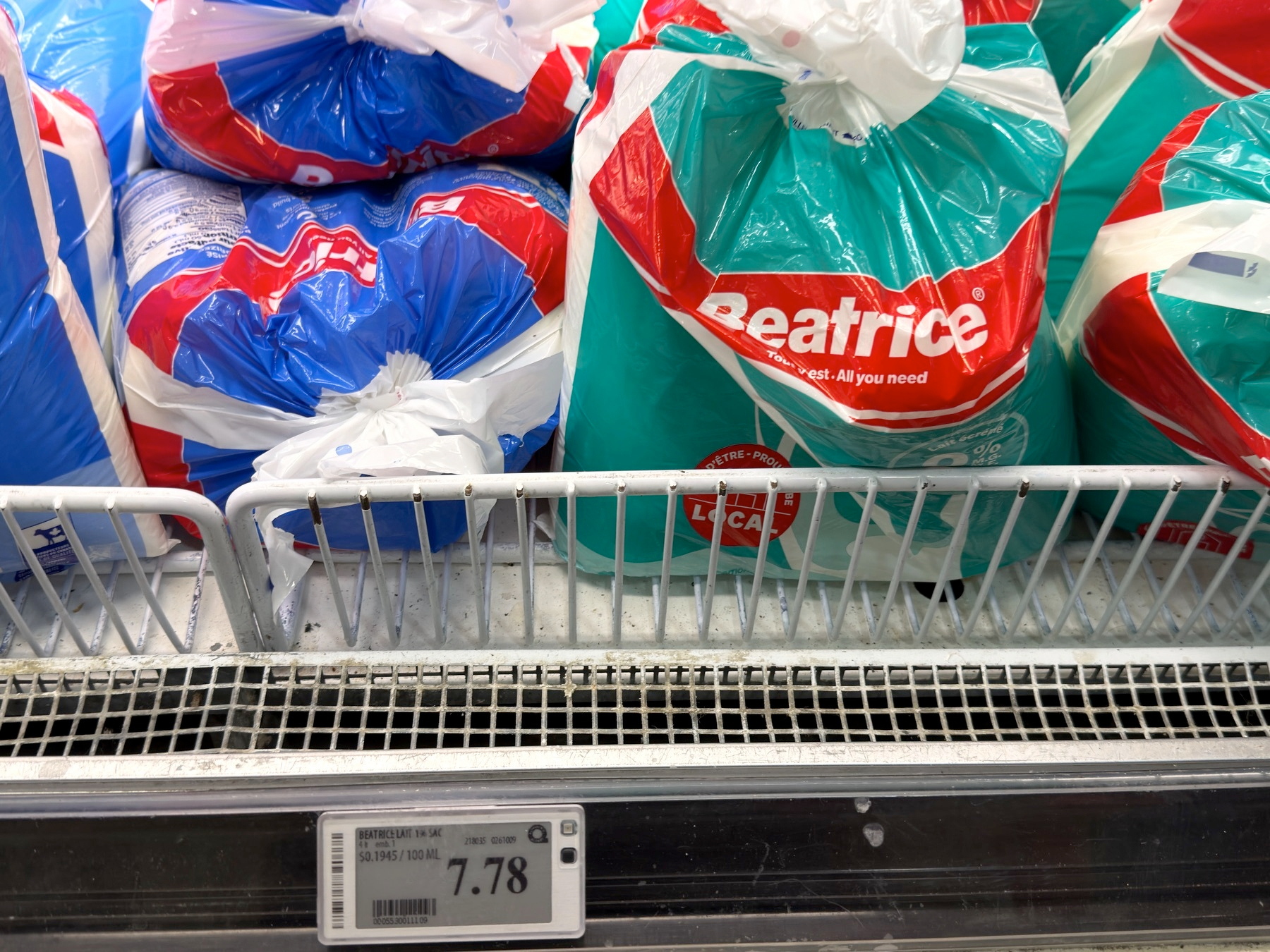 bags of dairy in a grocery store