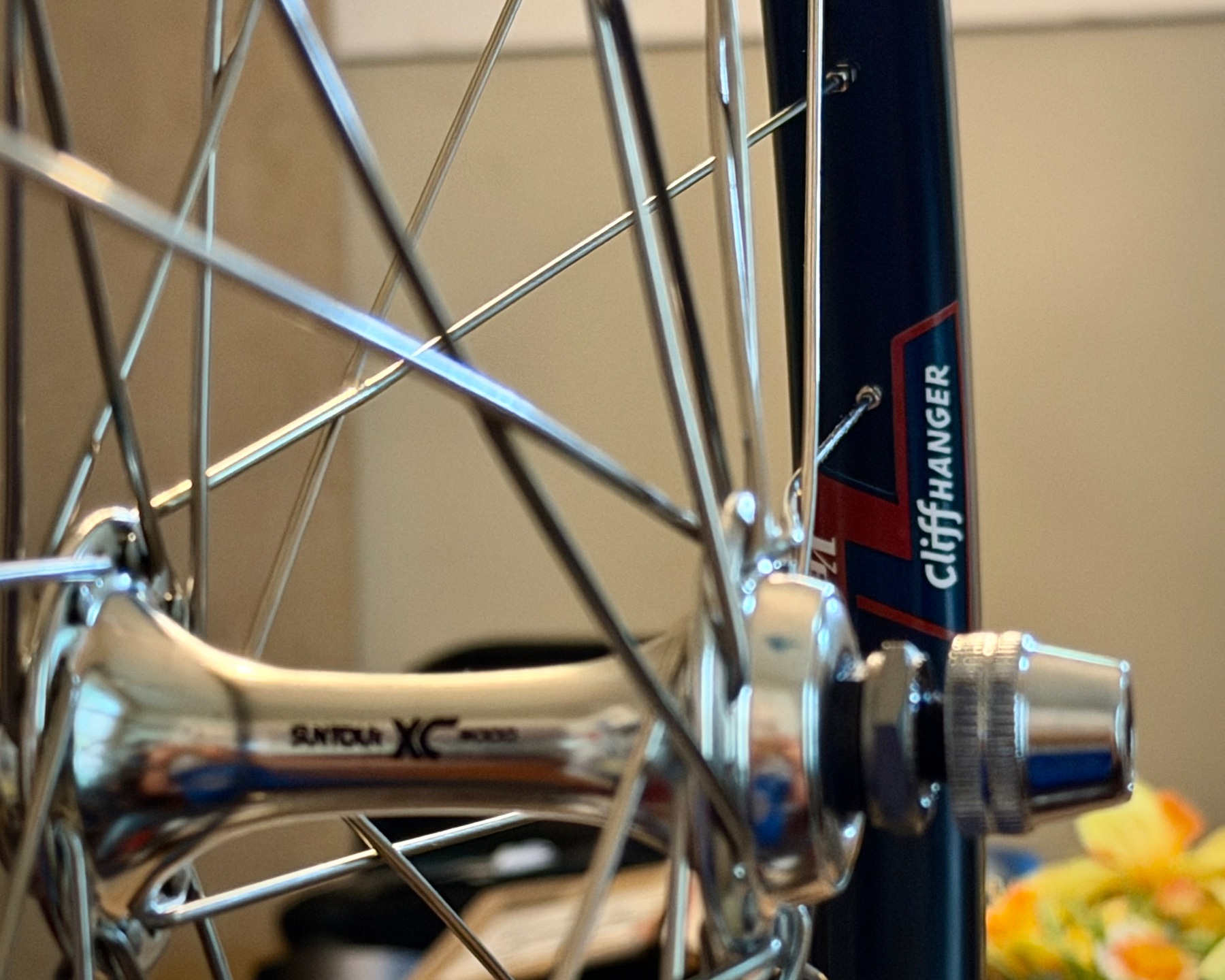 Shallow focus shot highlighting “Cliffhanger” sticker on the Velocity Cliffhanger rim I used