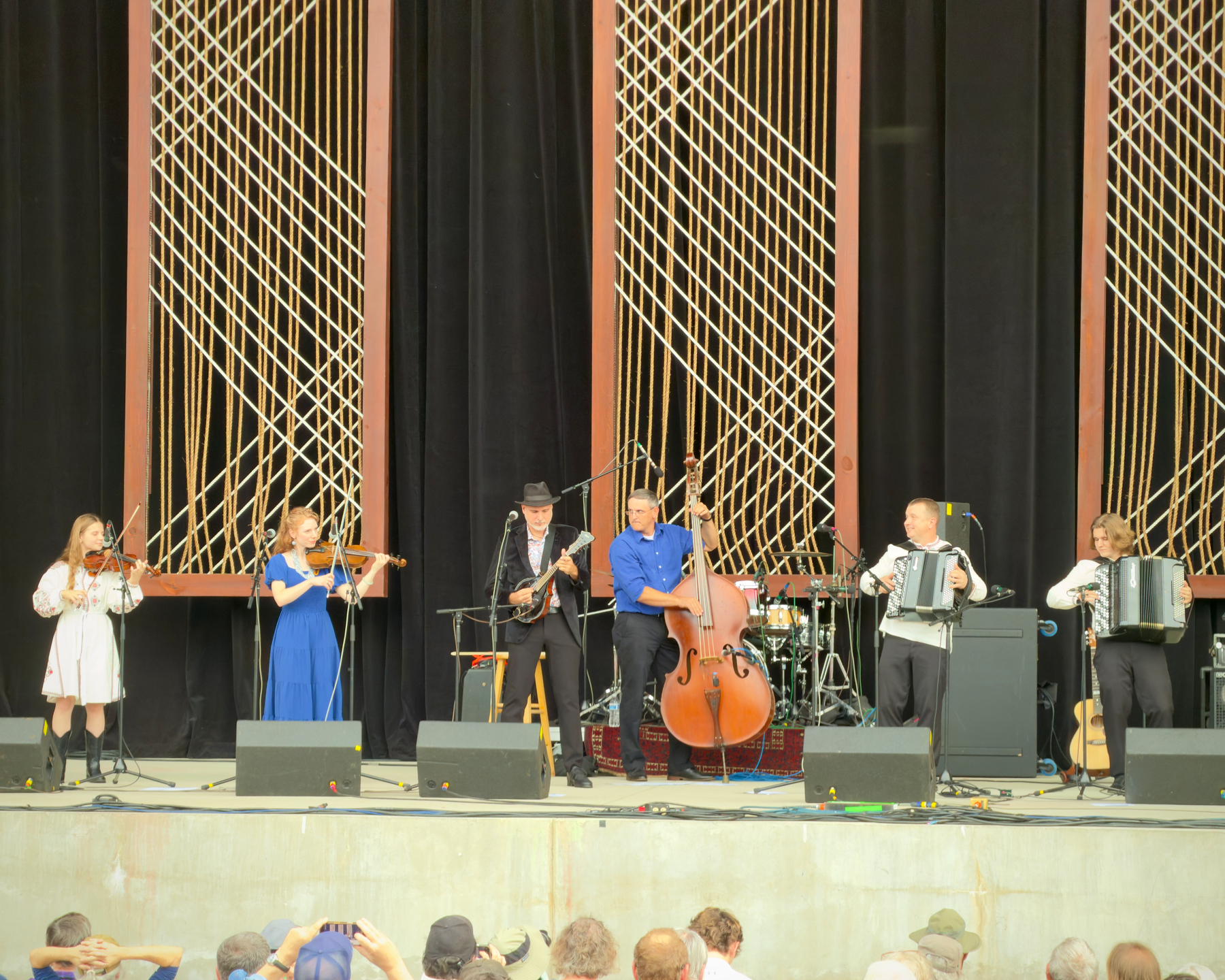 Danny Knicely and the Melichenko Family play at the Allianz Amphitheater during the 2026 Richmond Folk Festival.