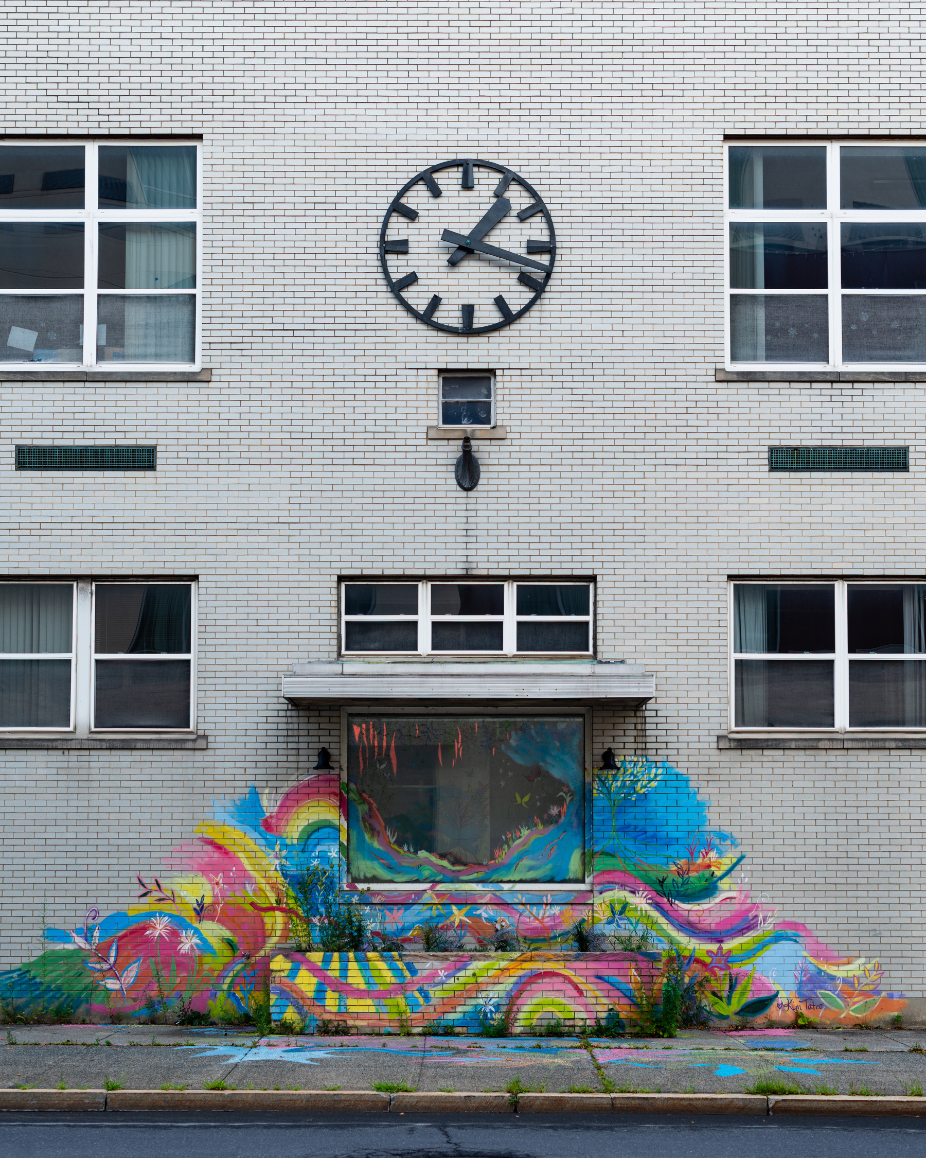abstract rainbow graffiti on an old building in Troy, NY