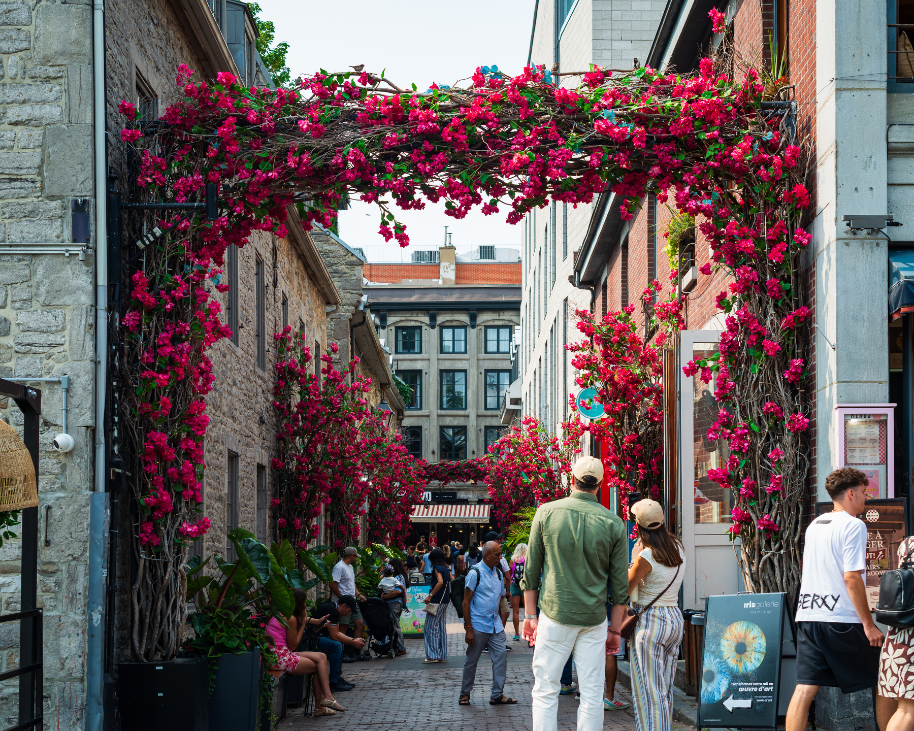 flower arch over the entrance to Rue St.-Amable off Place Jacques-Cartier in Viex-Port in old Montréal
