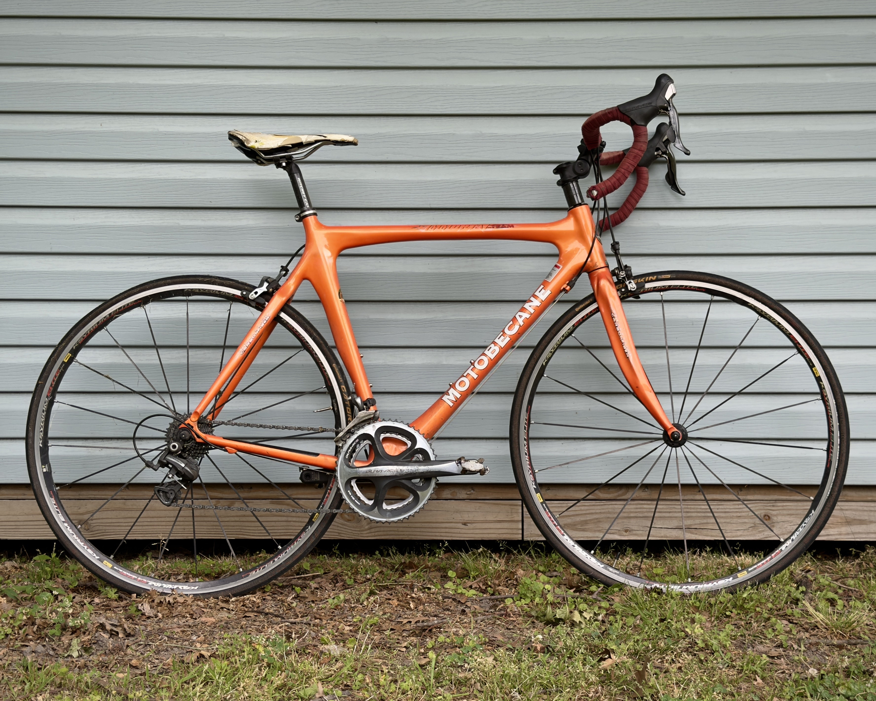 2013 Motobecane Immortal Team road bike leaning against my shed