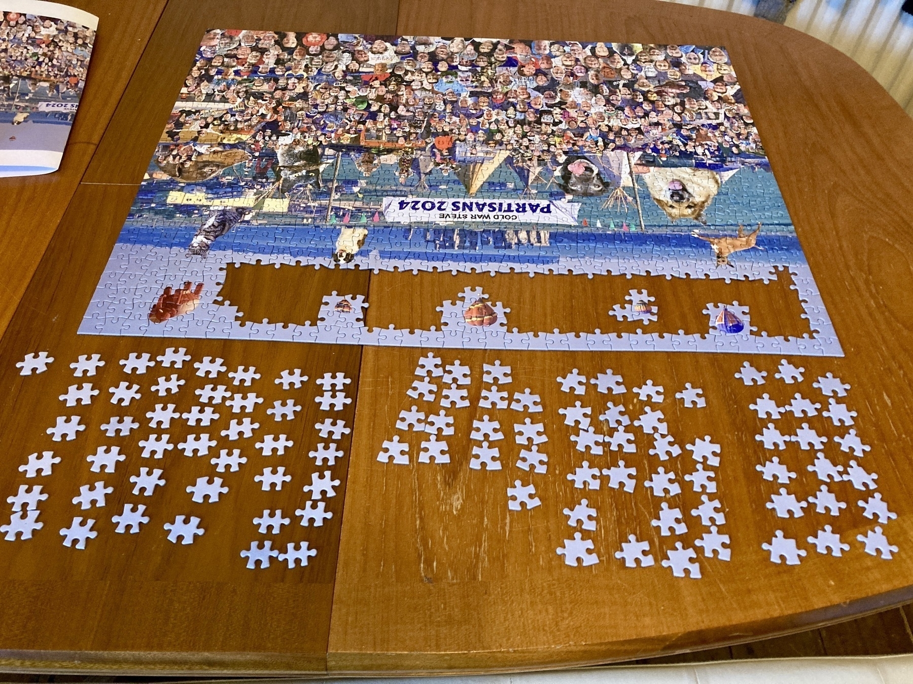 A 4/5th complete jigsaw puzzle. The completed bit is complex and colourful. The remaining 100-ish pieces are all the same light blue colour. 