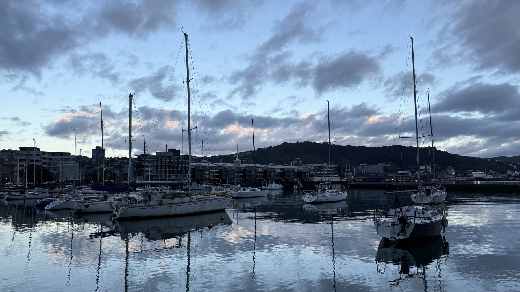 Cloud reflections and boats