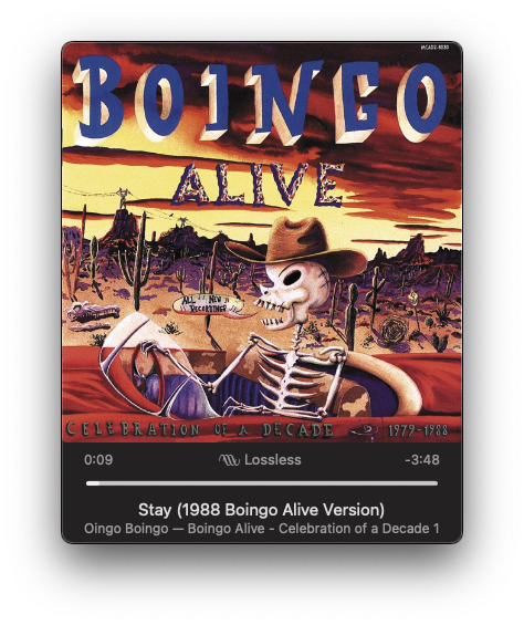 An album cover featuring a skeleton in a cowboy hat playing a guitar in a desert landscape with the text Boingo Alive.