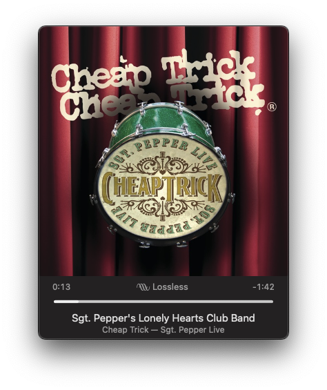 A music player interface displays the album art for Cheap Trick's Sgt. Pepper Live with a track titled Sgt. Pepper's Lonely Hearts Club Band.