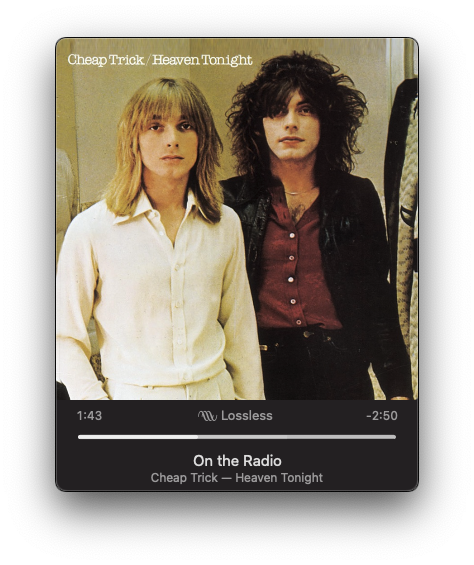 An album cover for Heaven Tonight by Cheap Trick featuring two band members, along with song details displayed below.