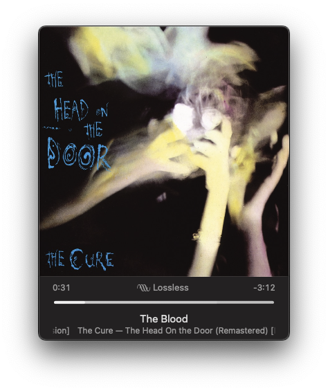 An album cover features abstract artwork with the text The Head on the Door and The Cure along with audio controls for the song The Blood.