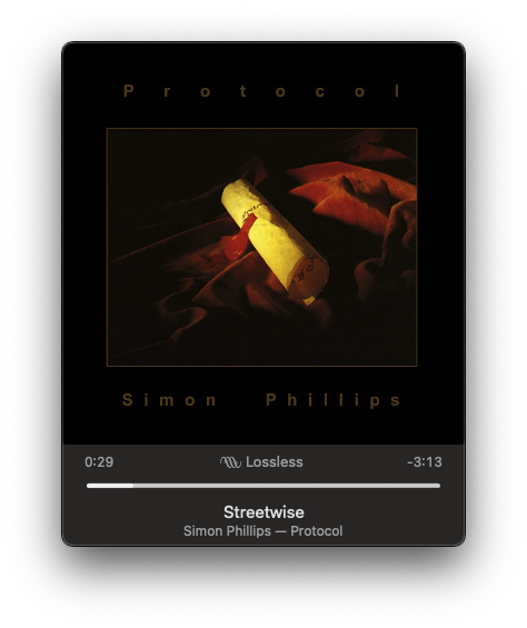 A music player interface shows Streetwise by Simon Phillips from the album Protocol, featuring an abstract cover art with a yellow cylindrical object on a dark background.