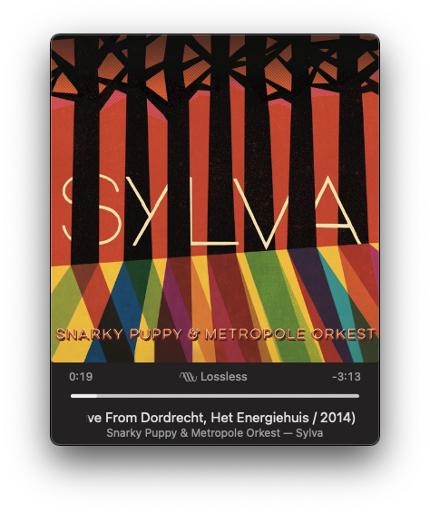 An album cover titled Sylva by Snarky Puppy and Metropole Orkest features abstract colorful patterns with silhouettes of trees.