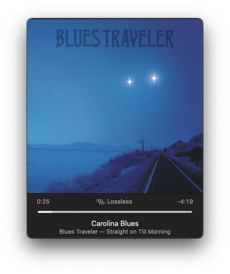 A music player displays Carolina Blues by Blues Traveler from the album Straight on Till Morning, with an image of a night sky and two bright stars over a railroad track.