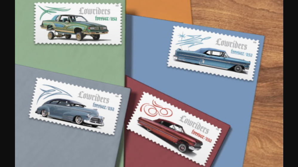 Four colorful envelopes are adorned with stamps featuring illustrations of lowrider cars and decorative designs.
