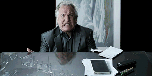 Alan Rickman turning a table over