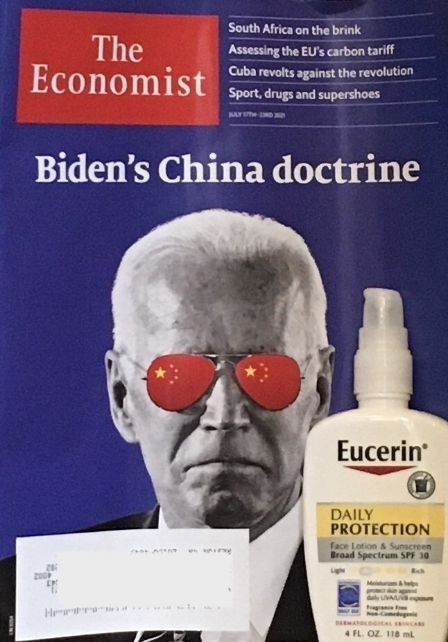 Photo of Economist cover with sunblock bottle.