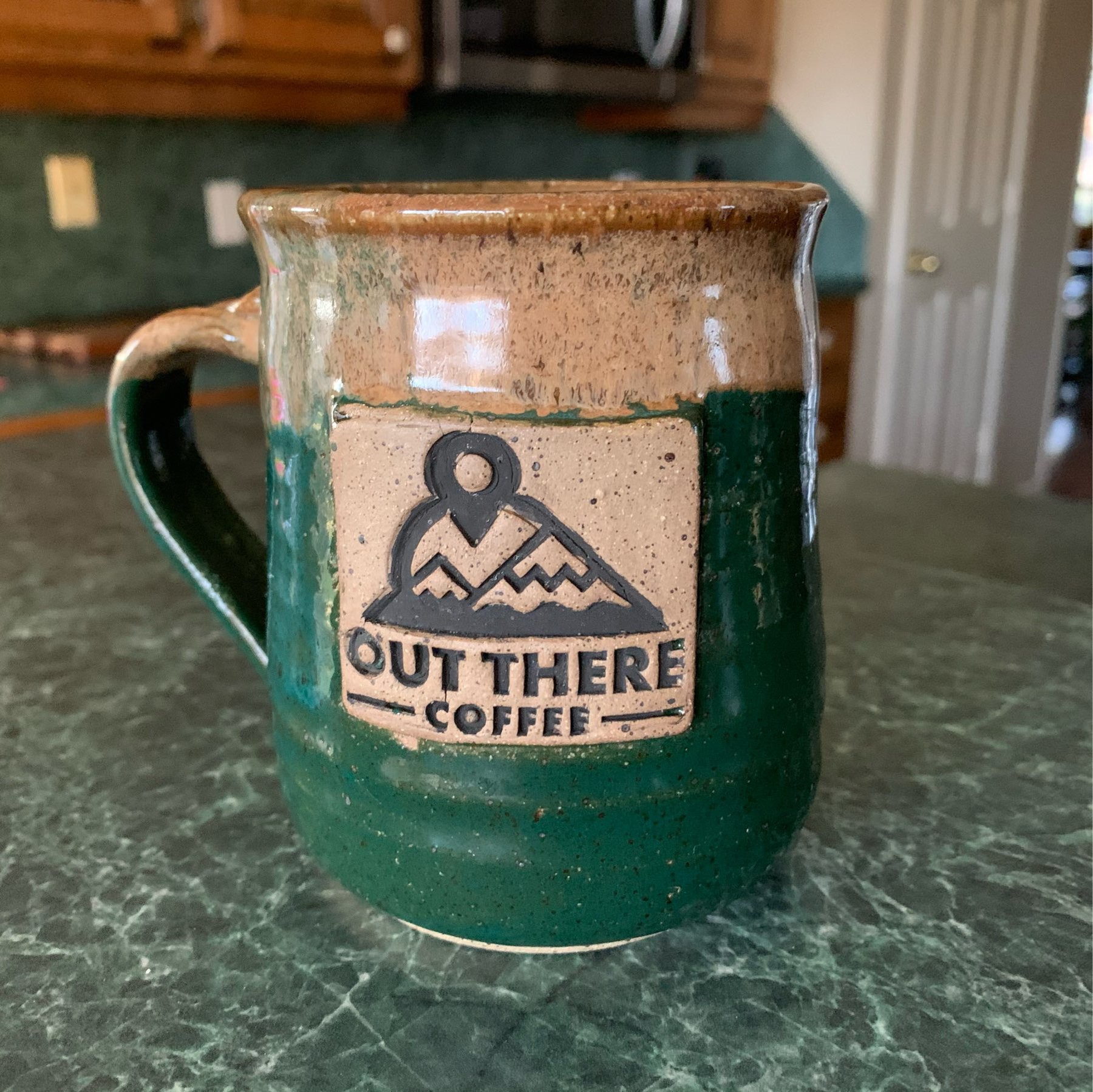 Pottery coffee mug on a counter