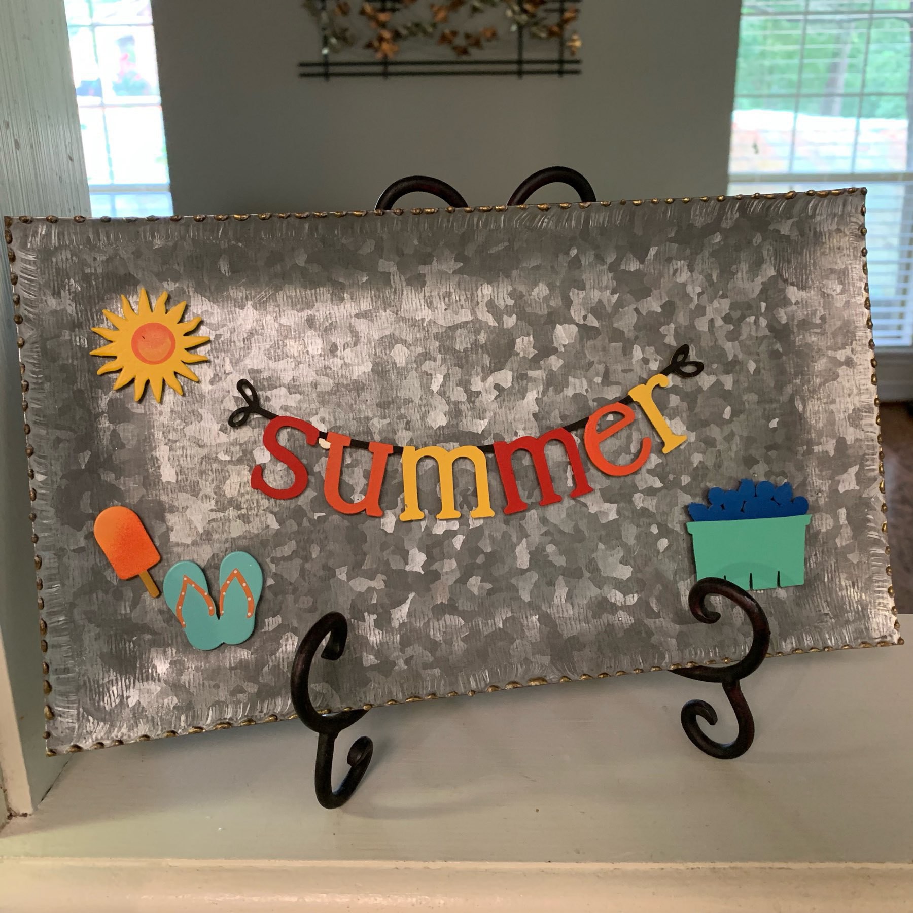 Magnetic board with sun, ice cream, sandles, and blueberry magnets