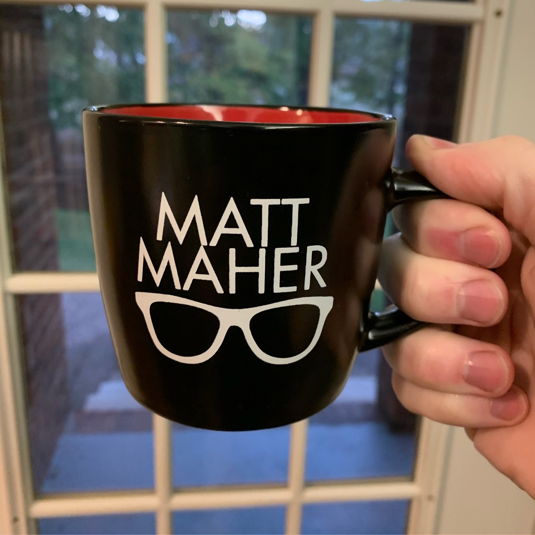 Matt Maher mug in front of a window. 
