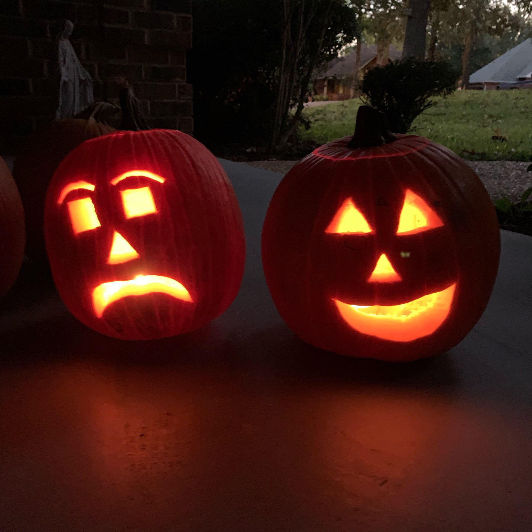 Carved pumpkins lit