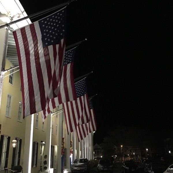 Flags over Congress Hall at night, Cape May, NJ