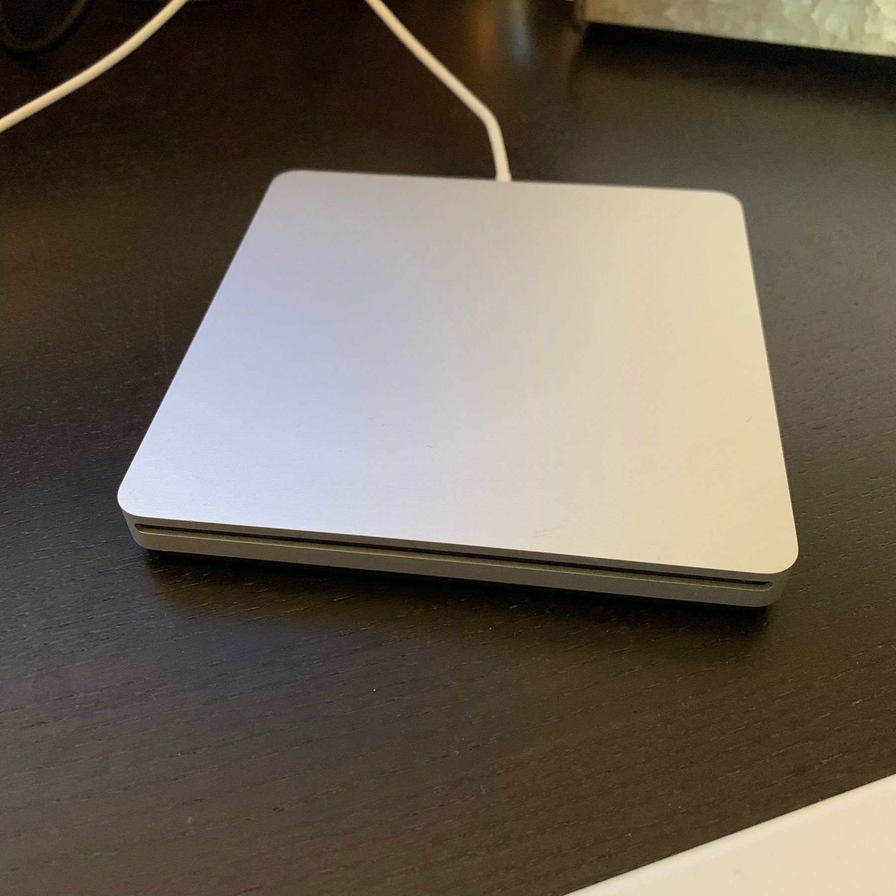 Apple external disk drive on desk