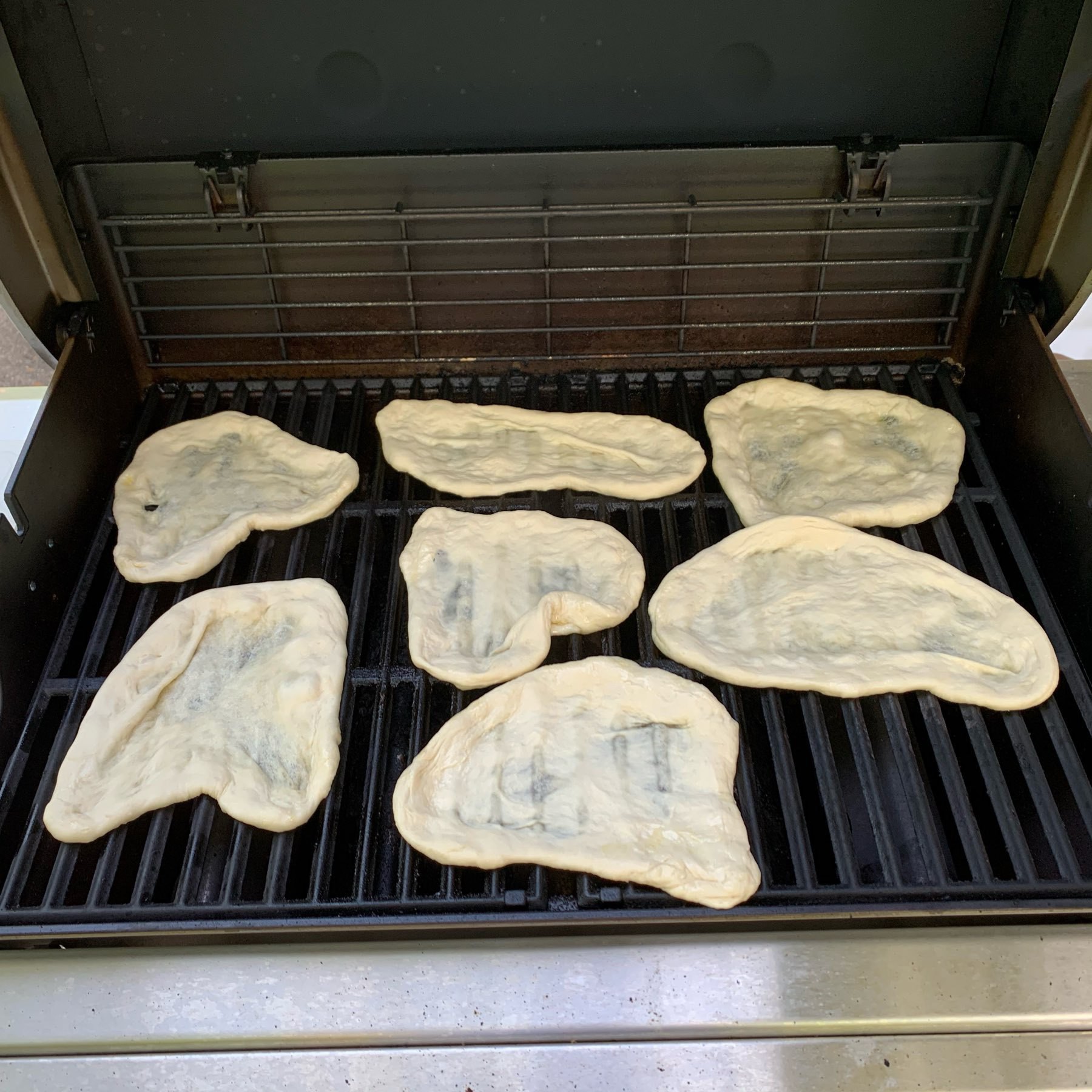 Pizza dough on the grill